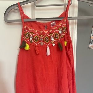 red justice tank top; multicolor with sequence and fringe